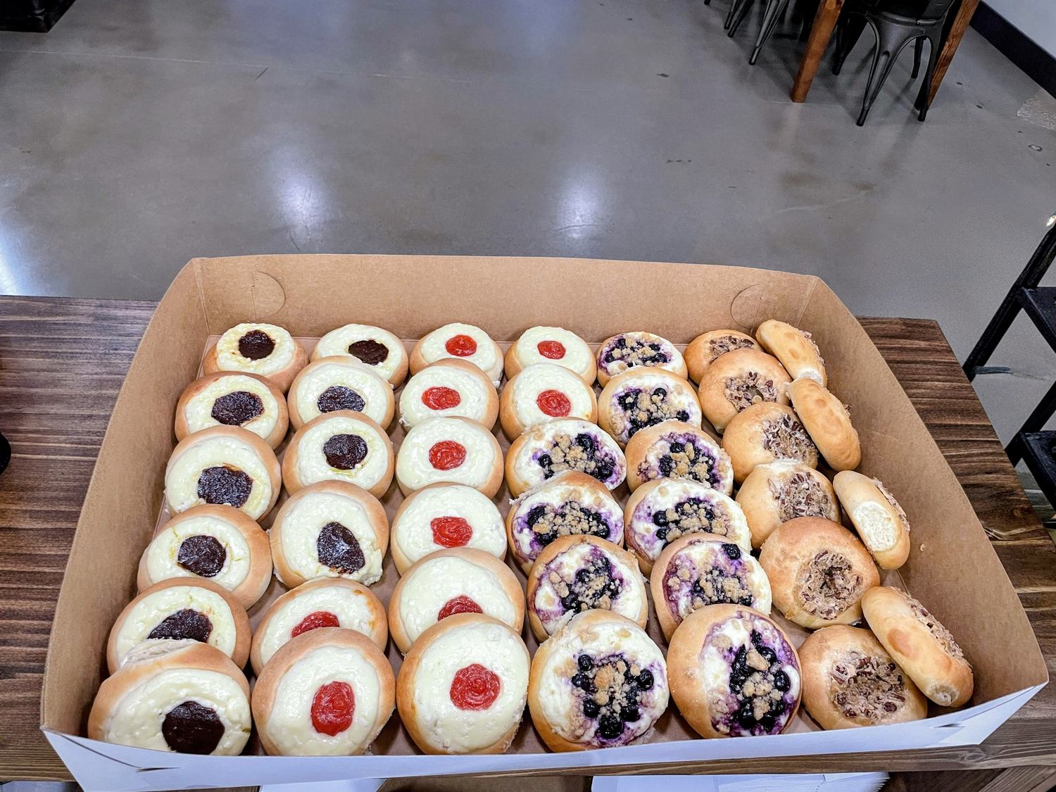 Tray of sweet cream cheese and fruit kolaches